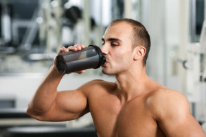 muscular-man-drinking-protein-shake